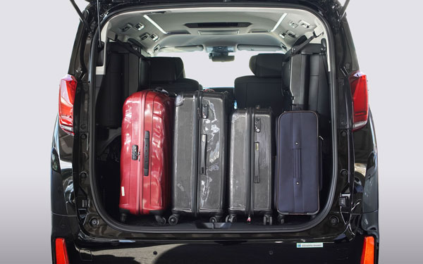 MPV rear luggage space prepared for a family trip from Singapore to Melaka